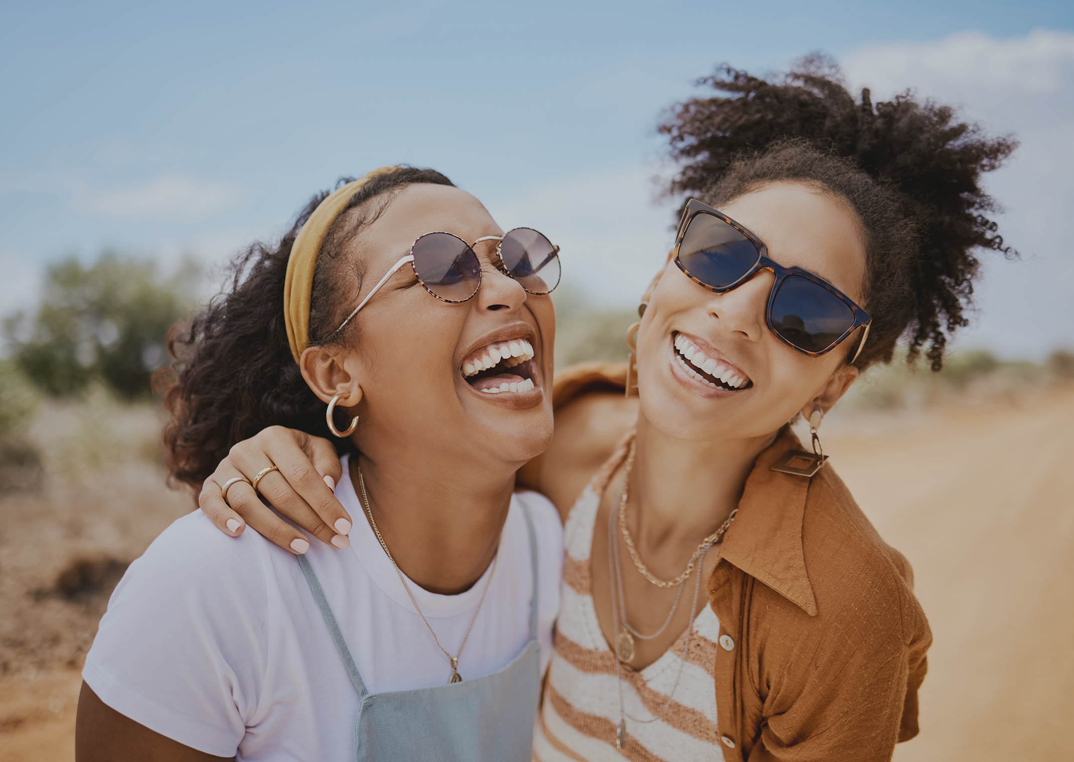 women outside smiling