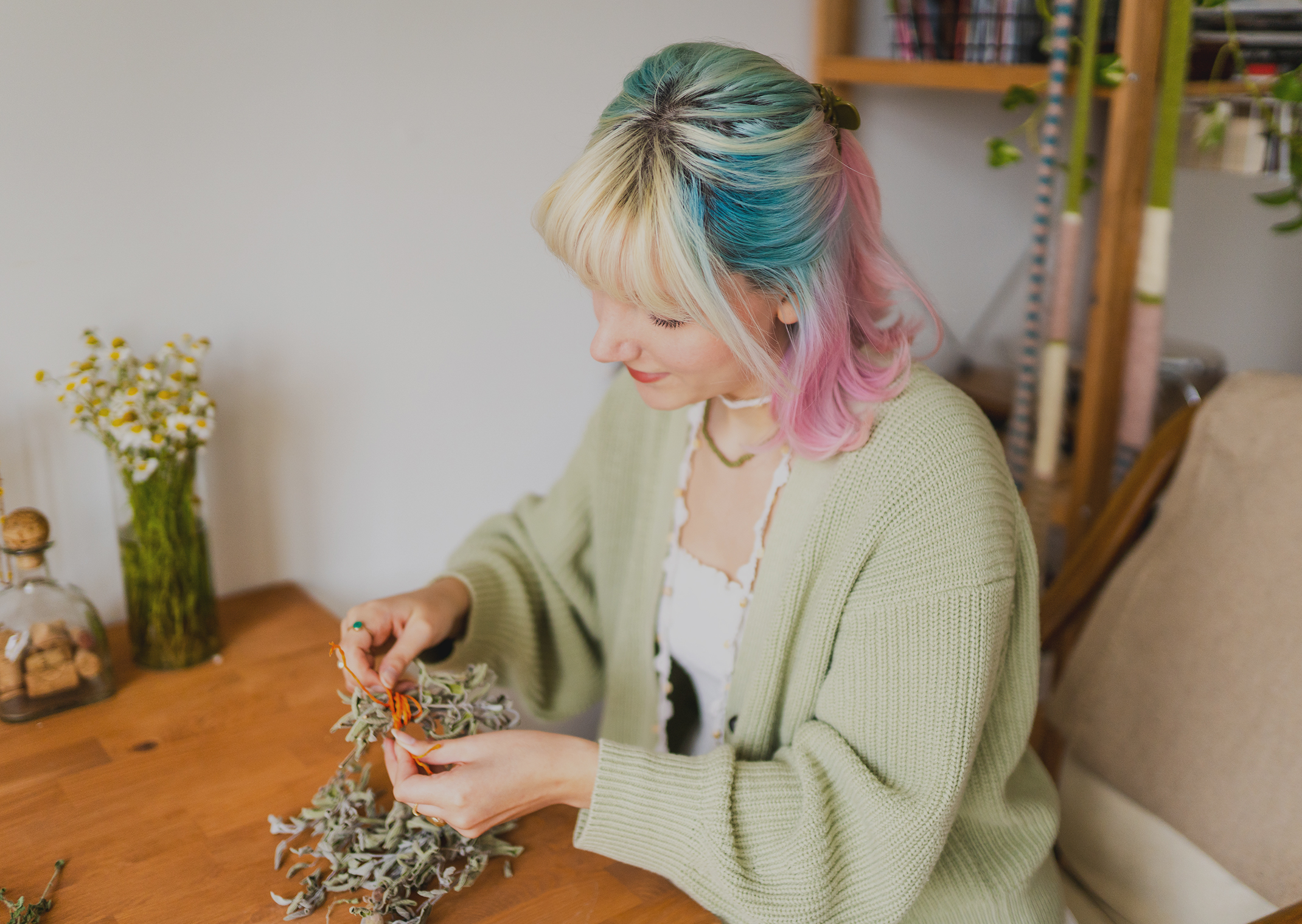 woman at table looking at something